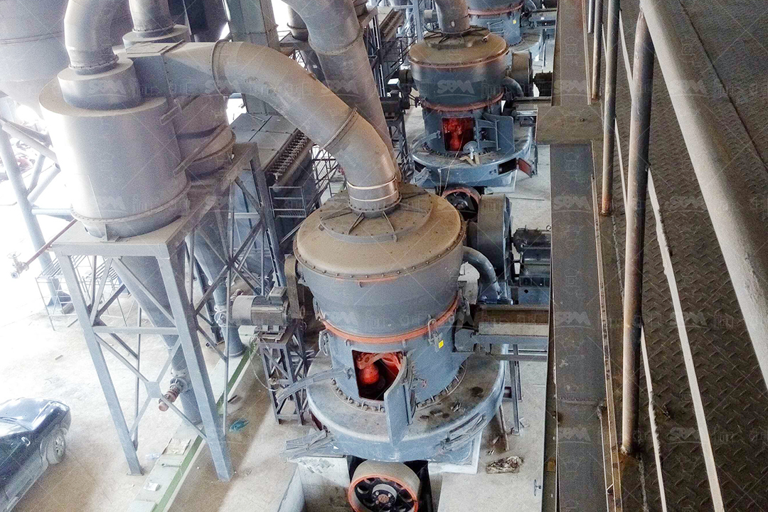 A modern grinding mill installation in an industrial plant, showing compact layout and clean operation